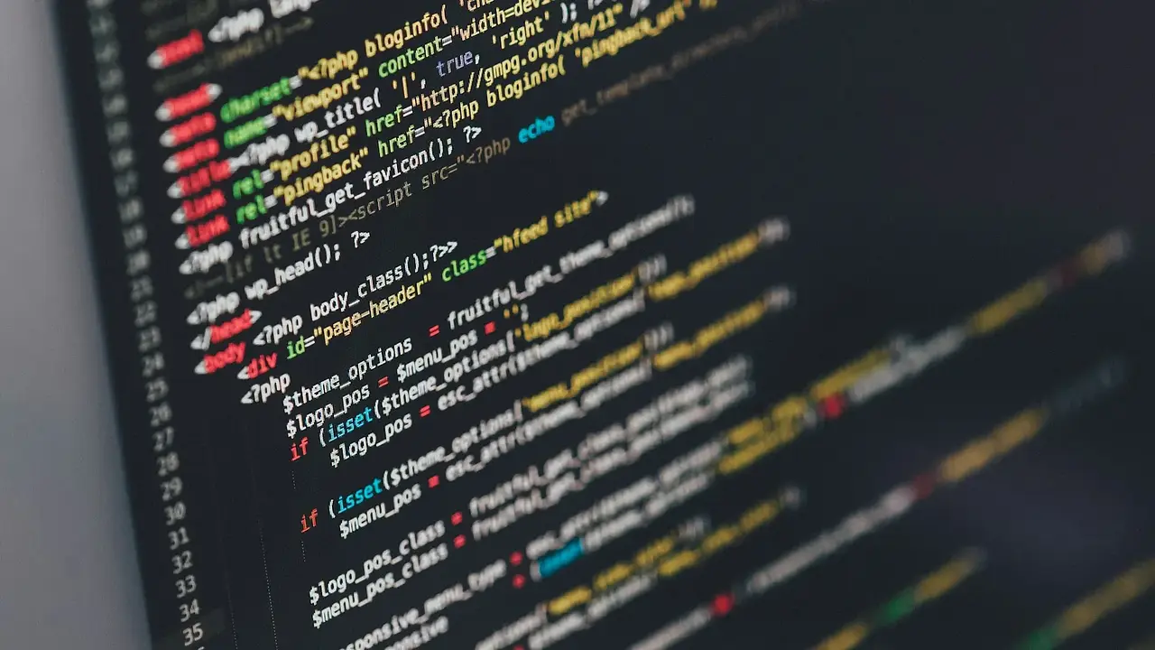 Programming code displayed across a computer monitor