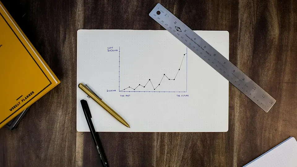 A pen and planning notes on a sheet of paper